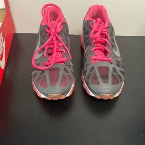 Nike Gray and Pink Athletic Shoes with Supportive Design